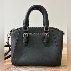 Michael Kors tiny bag with top handle and adjustable shoulder strap